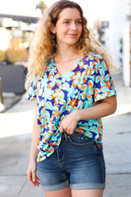 Load image into Gallery viewer, Blue & Orange Flat Floral V Neck Top