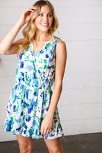 Load image into Gallery viewer, Lovely In Green & Blue Floral Sleeveless Surplice Romper