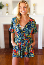 Load image into Gallery viewer, Navy Tropical Floral Surplice Romper