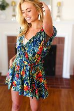 Load image into Gallery viewer, Navy Tropical Floral Surplice Romper