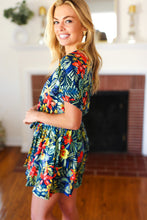 Load image into Gallery viewer, Navy Tropical Floral Surplice Romper