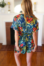 Load image into Gallery viewer, Navy Tropical Floral Surplice Romper