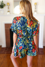 Load image into Gallery viewer, Navy Tropical Floral Surplice Romper