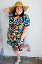 Load image into Gallery viewer, Navy Tropical Floral Surplice Romper