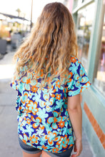 Load image into Gallery viewer, Blue &amp; Orange Flat Floral V Neck Top
