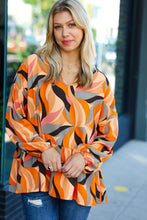 Load image into Gallery viewer, In My Thoughts Rust Abstract V Neck Peplum Top

