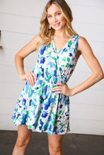 Load image into Gallery viewer, Green &amp; Blue Floral Sleeveless Surplice Romper

